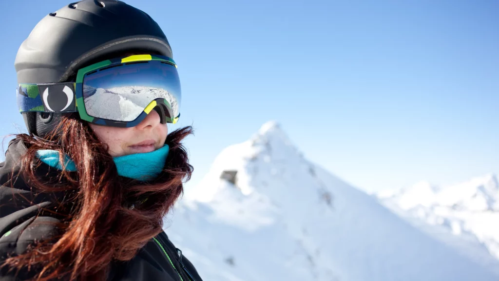 a woman wearing ski goggle