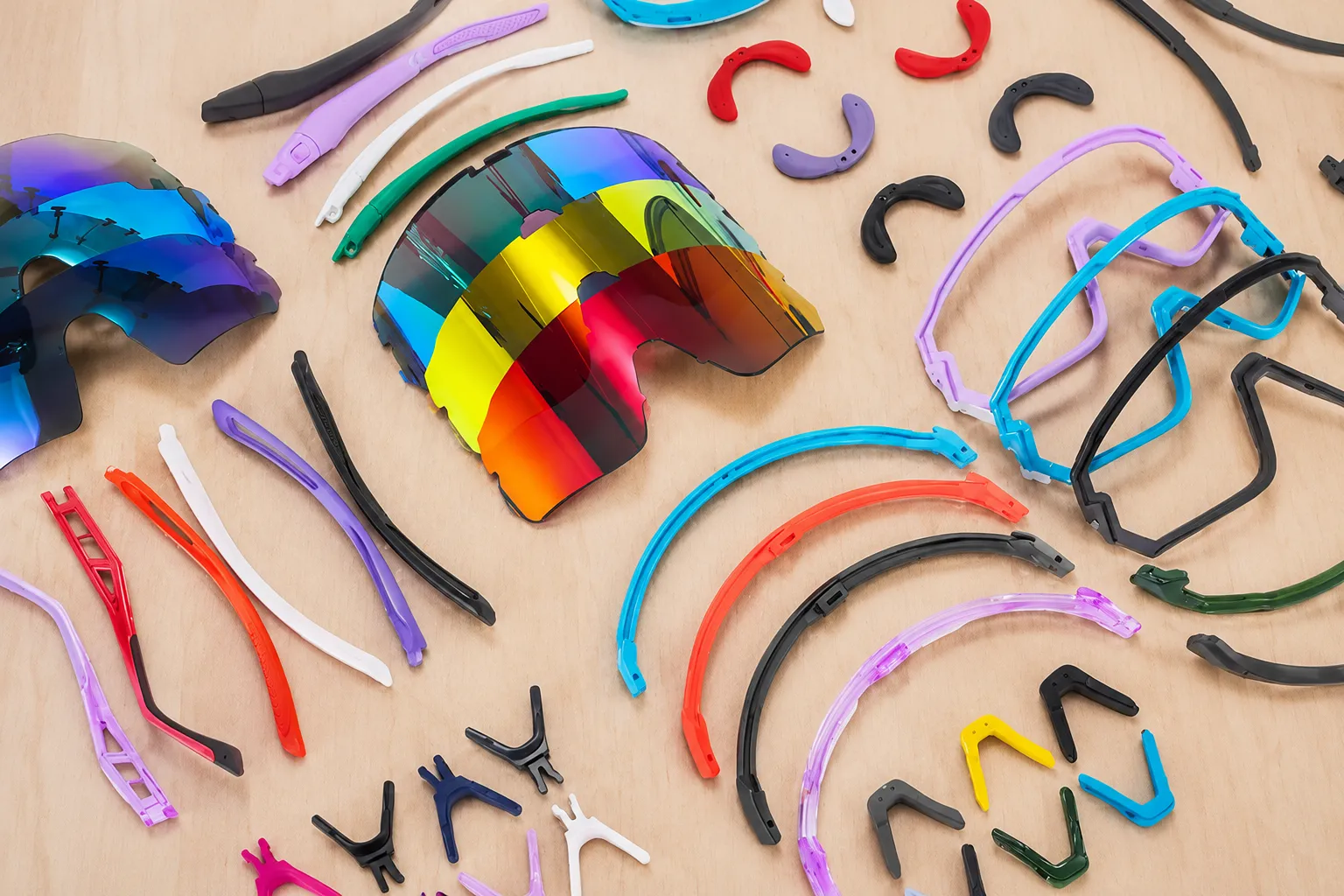 Customizable cycling goggle components, including interchangeable lenses, frame parts, temples and nose pads, for OEM and private label production