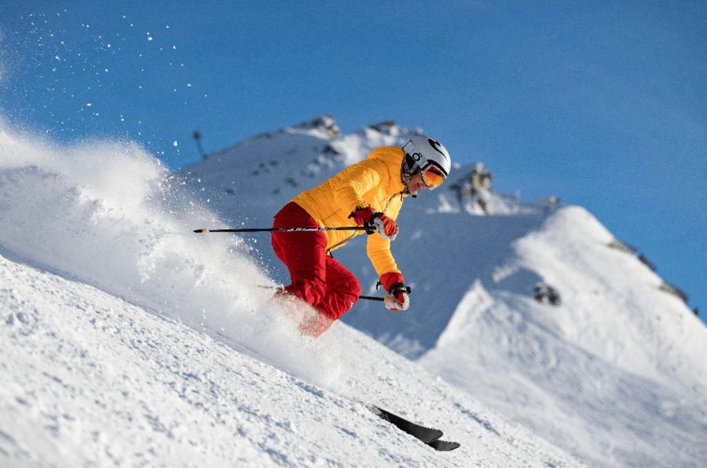 a man skiing with ski helmet